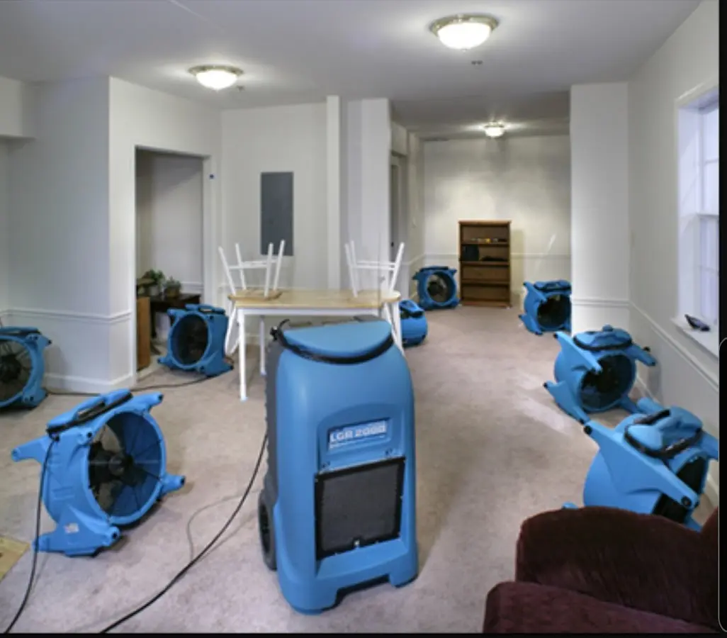Air movers and dehumidifier setup for Water Damage Restoration in Midlothian